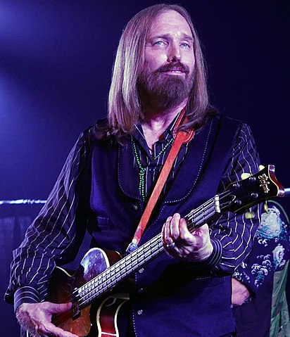 Tom Petty with a black guitar
