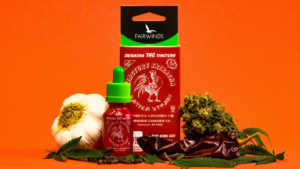 A product display of the cannabis infused Fairwinds Sriracha Sauce